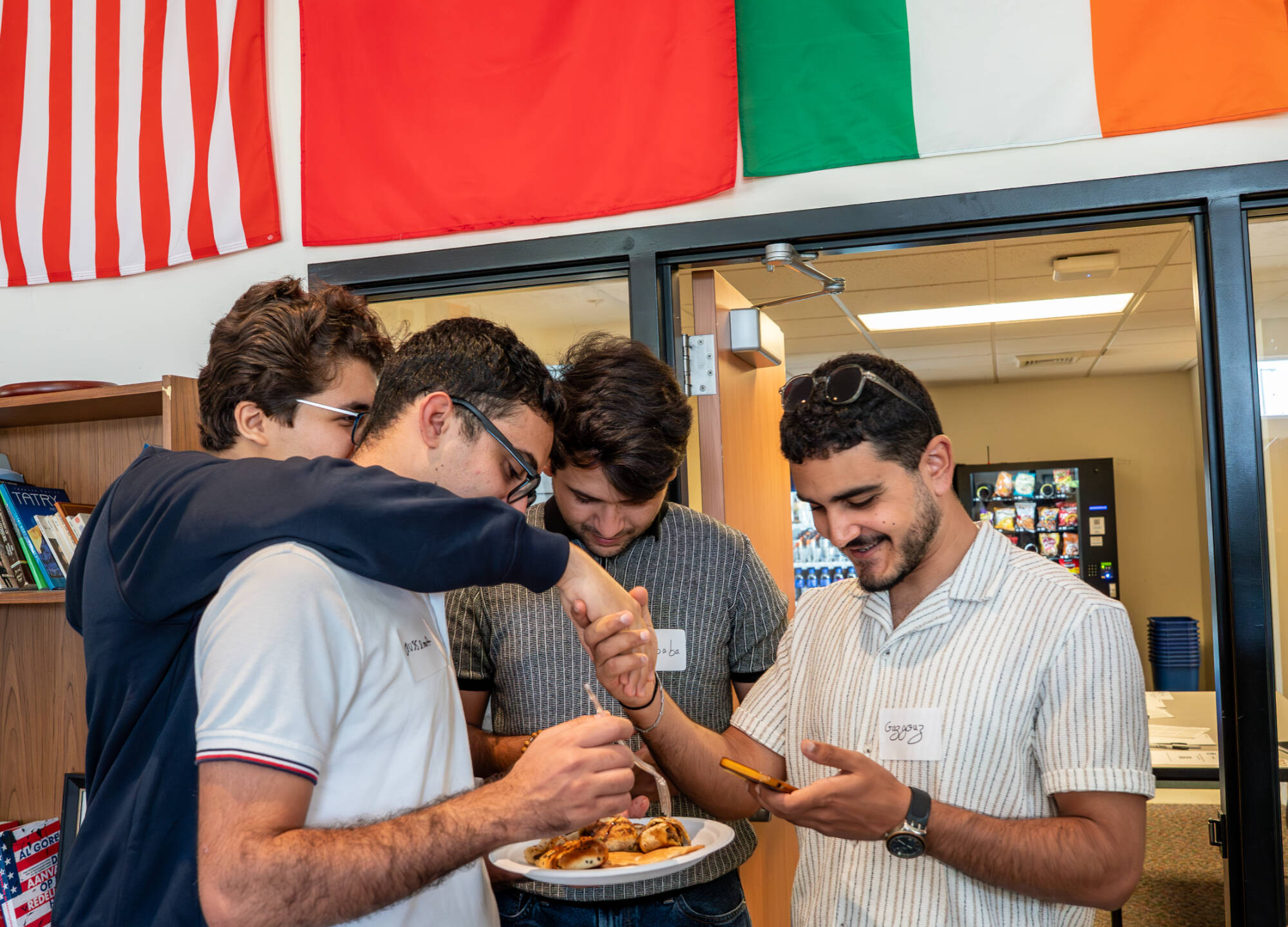 Students and faculty take part in the College of Computing and Modern Languages Mixer at the International House on the Valley Campus on September 12.
